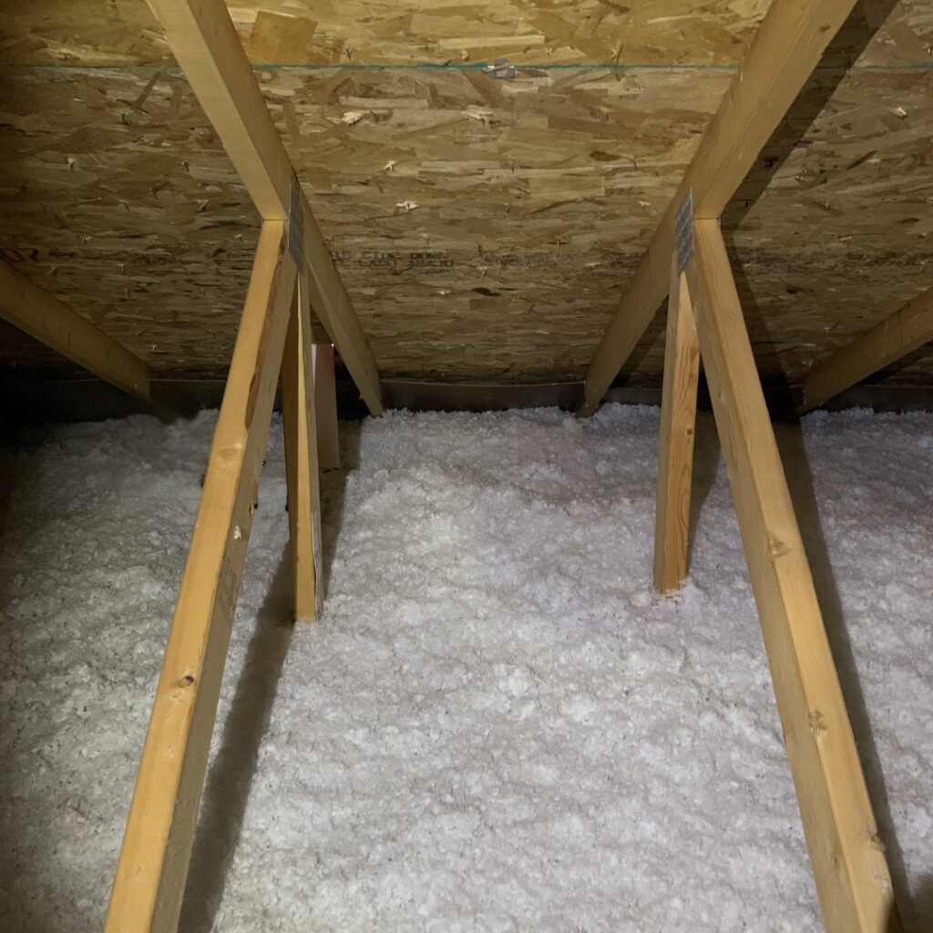Blown-in attic insulation Fargo showing a clean finish.