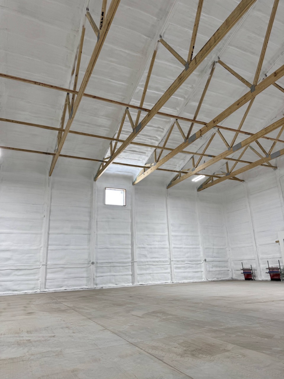 Open ceiling trusses ready for fiberglass insulation Fargo.