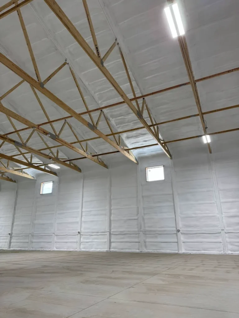 Fiberglass insulation installed inside metal building