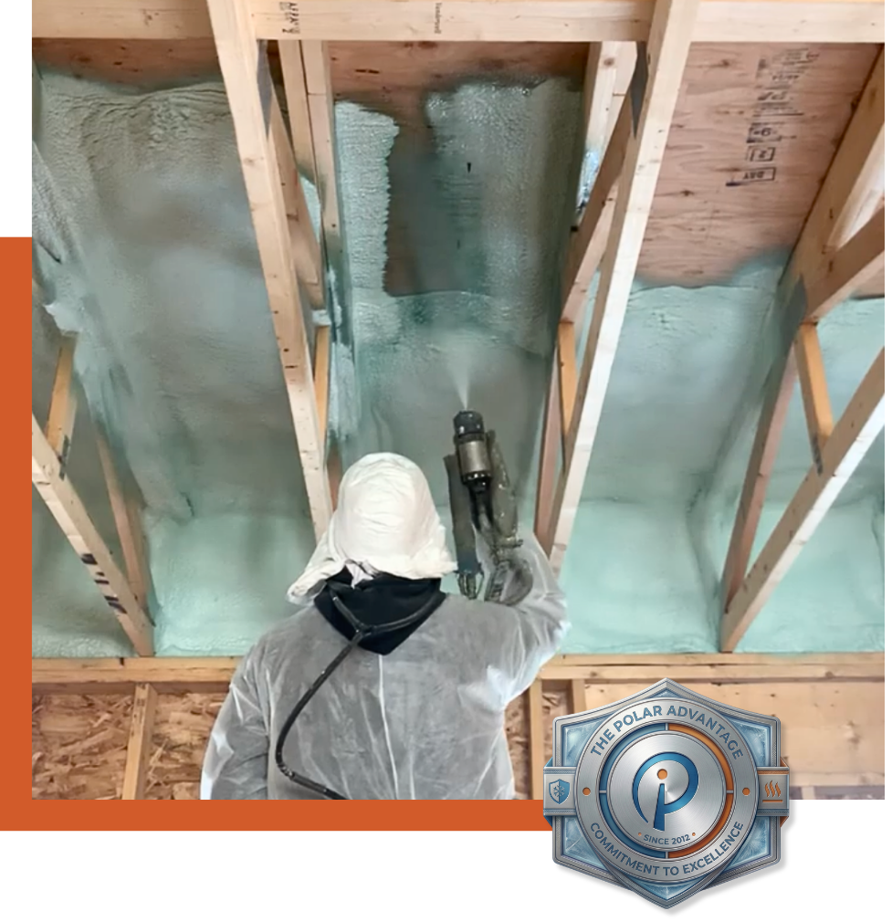 Contractor applying spray foam insulation.